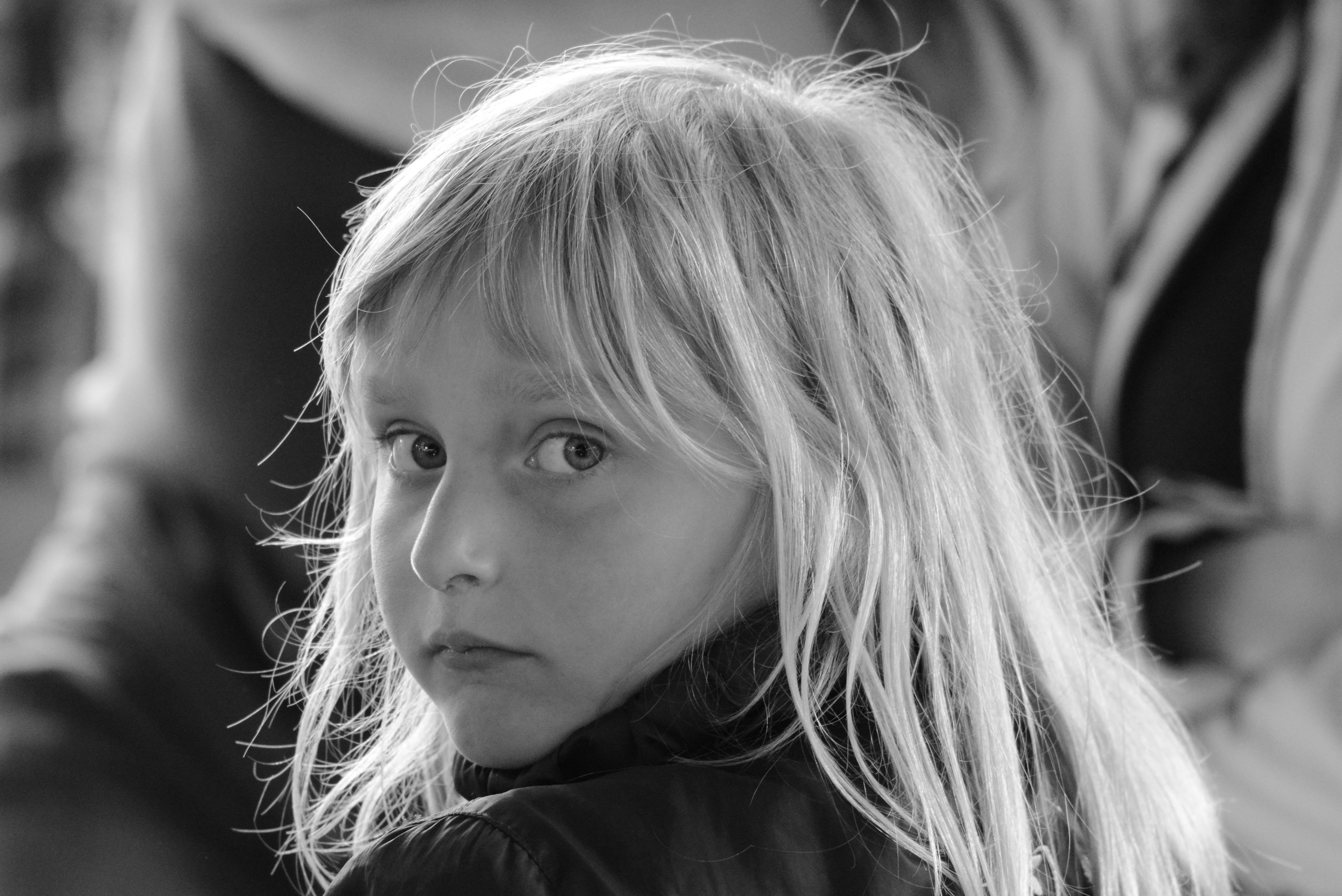 selective focus photography of girl wearing black top