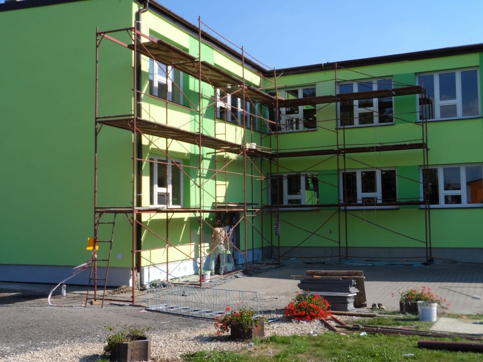 green concrete two-storey building preview