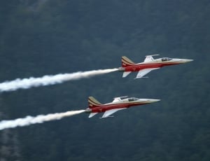 2 white and red aircraft thumbnail
