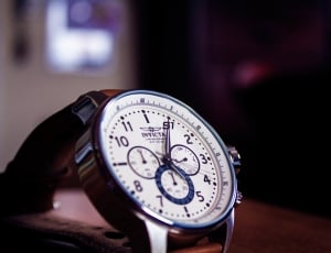 silver round invicta chronograph watch thumbnail