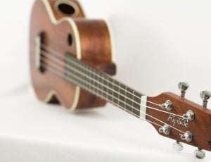 side view of brown RipTide ukulele thumbnail