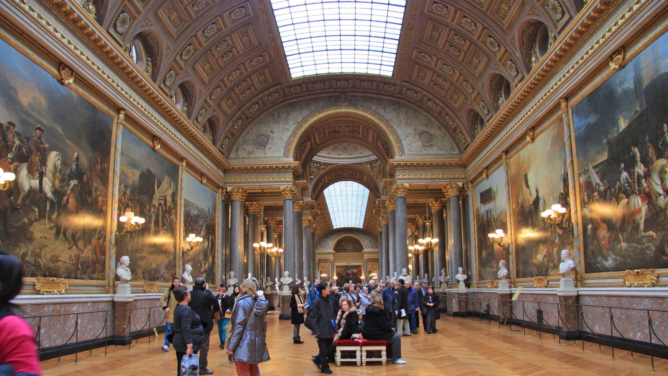 group of people in gallery during daytime