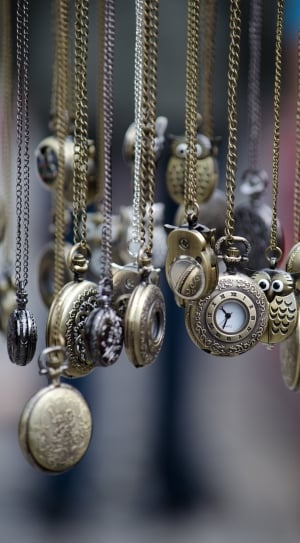 close up photography brass pocket watches thumbnail