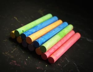shallow focus photography of assorted color pastels thumbnail