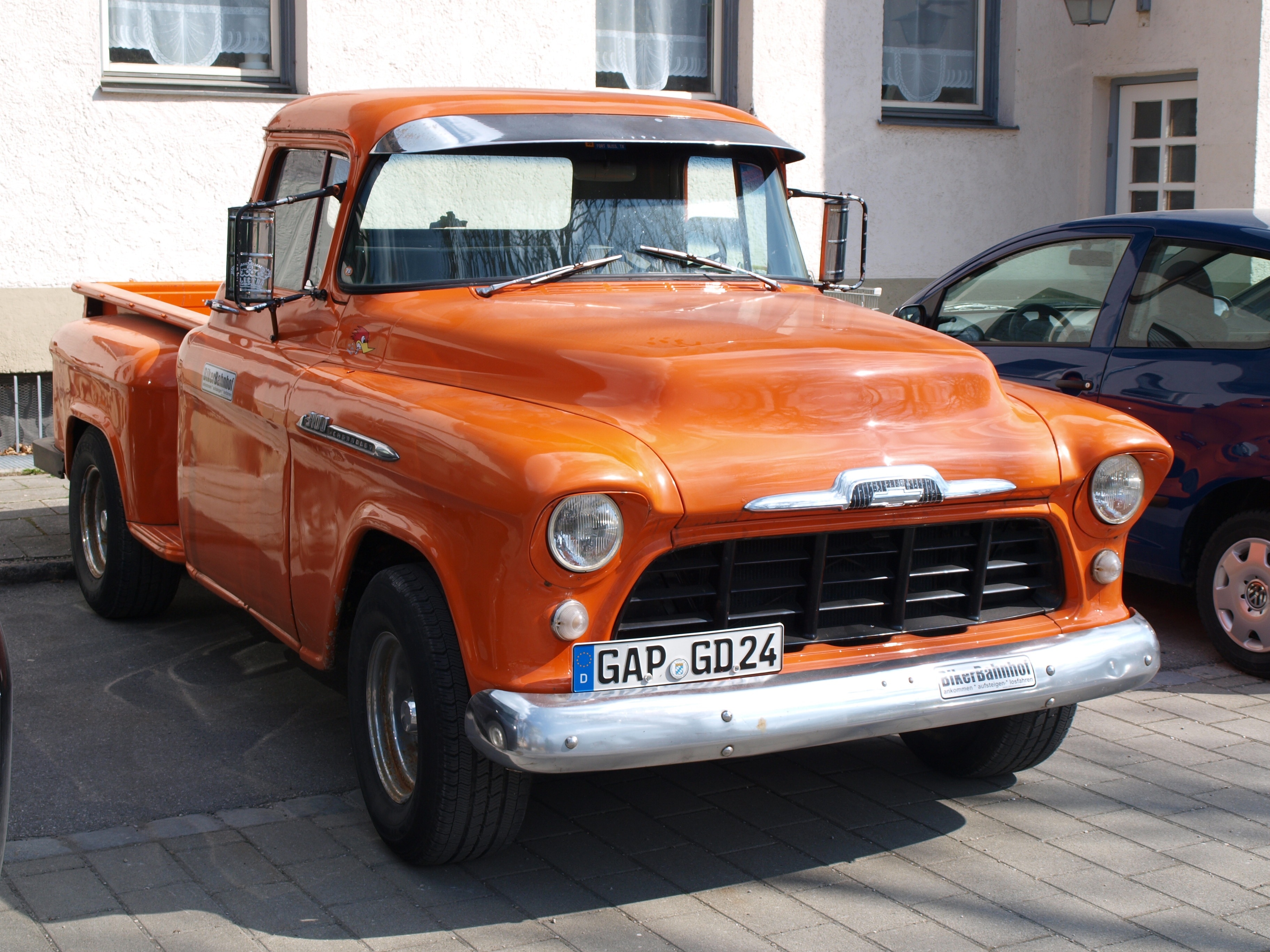 orange classic single cab pickup truck