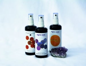 three purple and white labeled spray bottles thumbnail