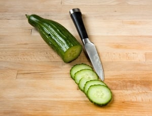 green cucumber beside knife thumbnail