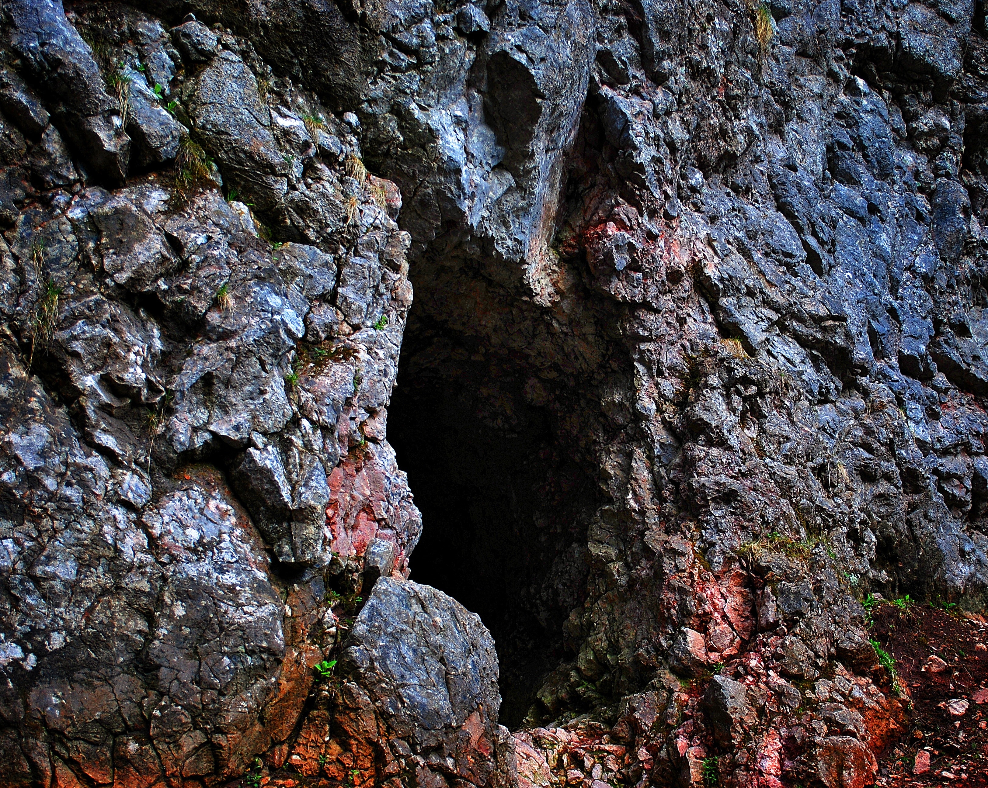 brown and red stone cave