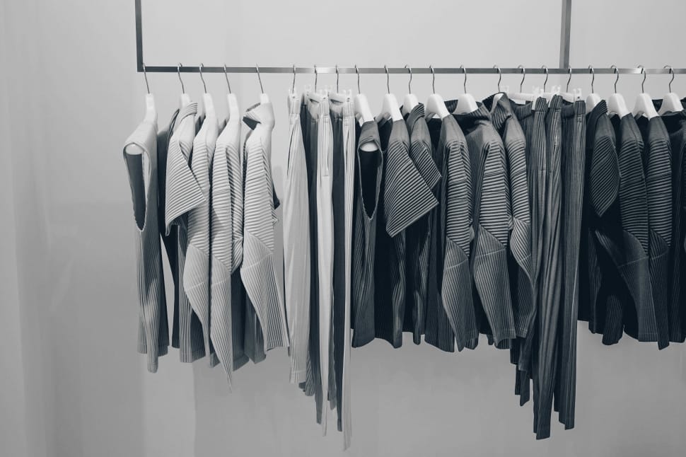 gray-and-black hanging clothes lot preview