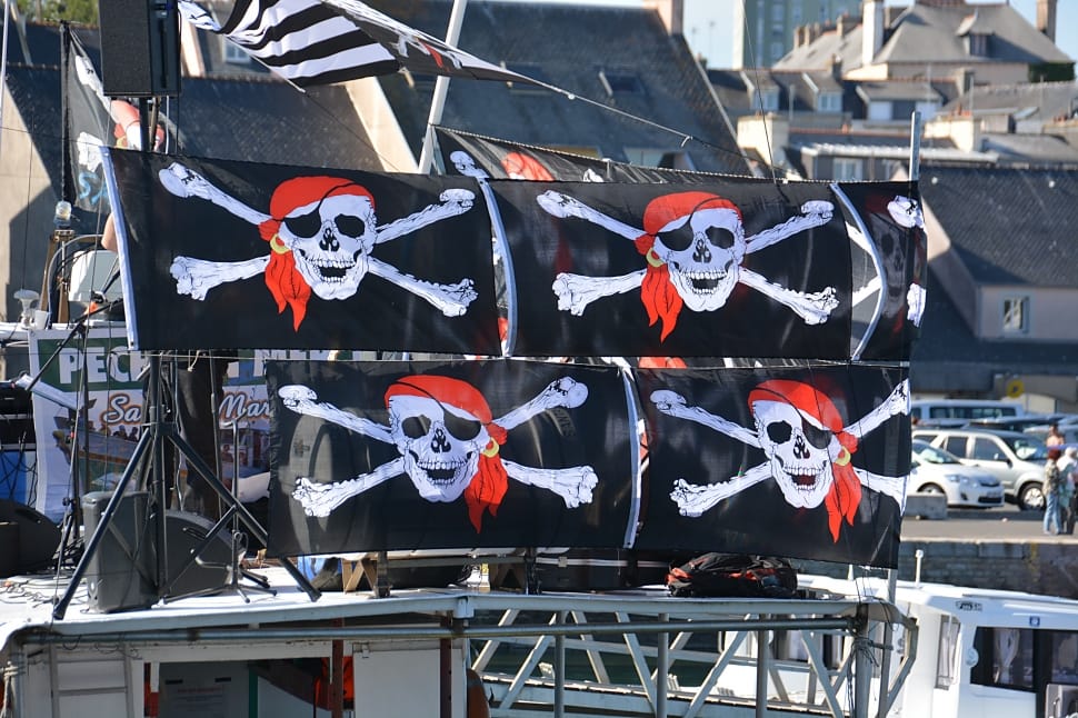 four black pirate flags preview