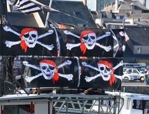 four black pirate flags thumbnail
