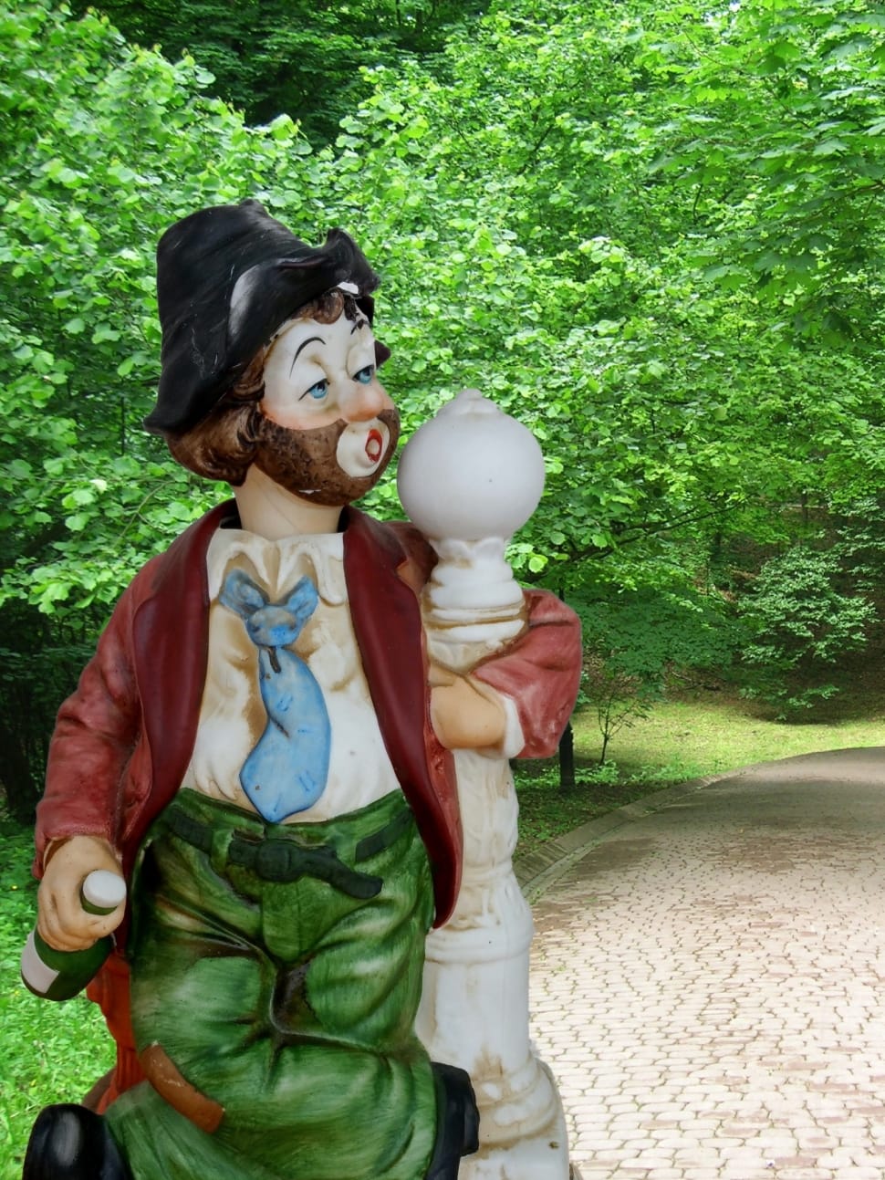man hug column and holding bottle ceramic figurine preview