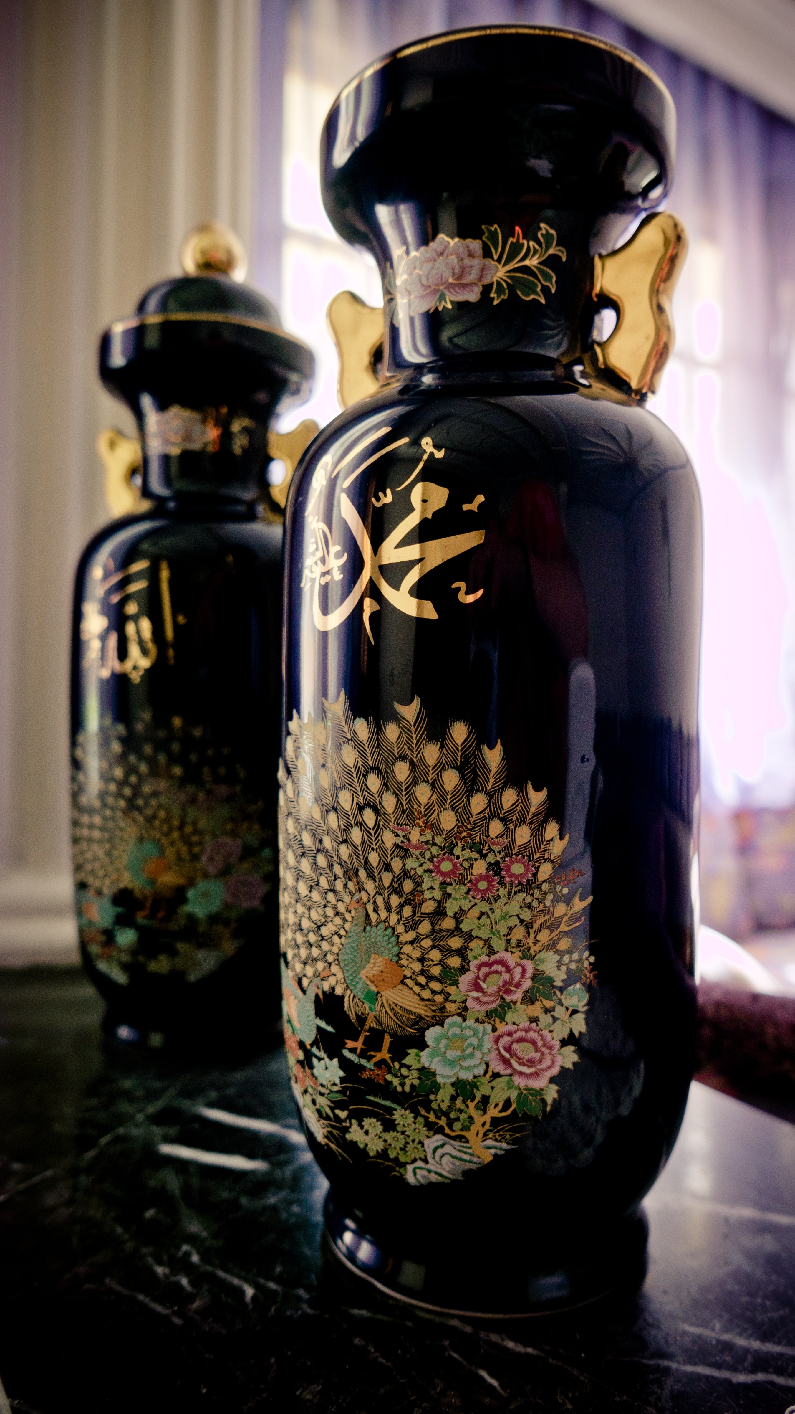 2 black gold and green floral vases set