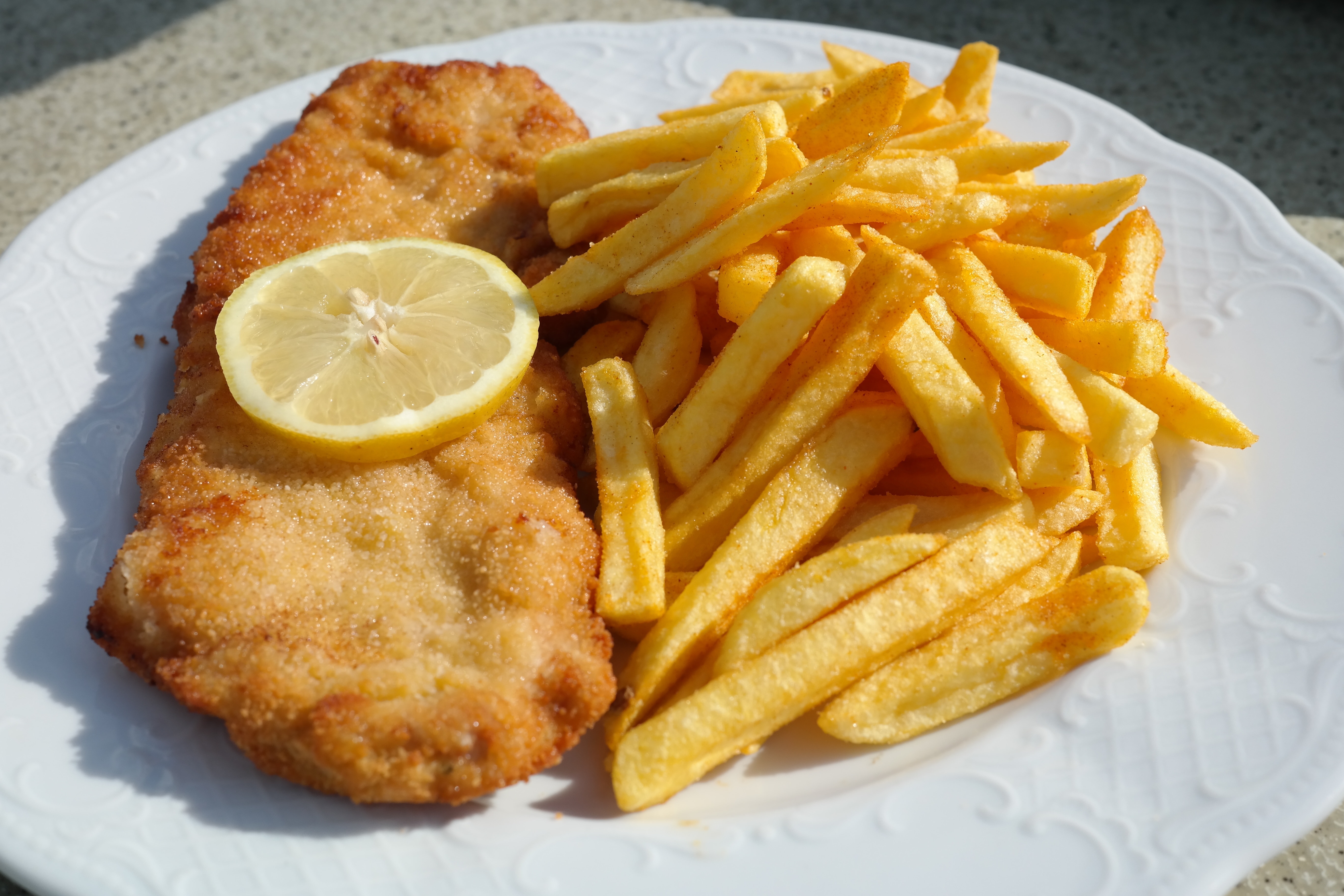 fries fish fillet and lime dish