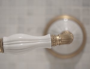 white and gold door lever thumbnail