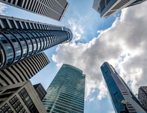 low angle photography of high rise buildings thumbnail