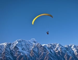 person with yellow air glider gliding on air thumbnail