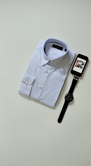 blue and white checked sport shirt and ipod touch and black watch thumbnail