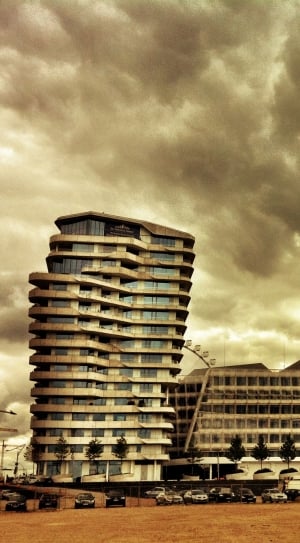 building and gray clouds thumbnail