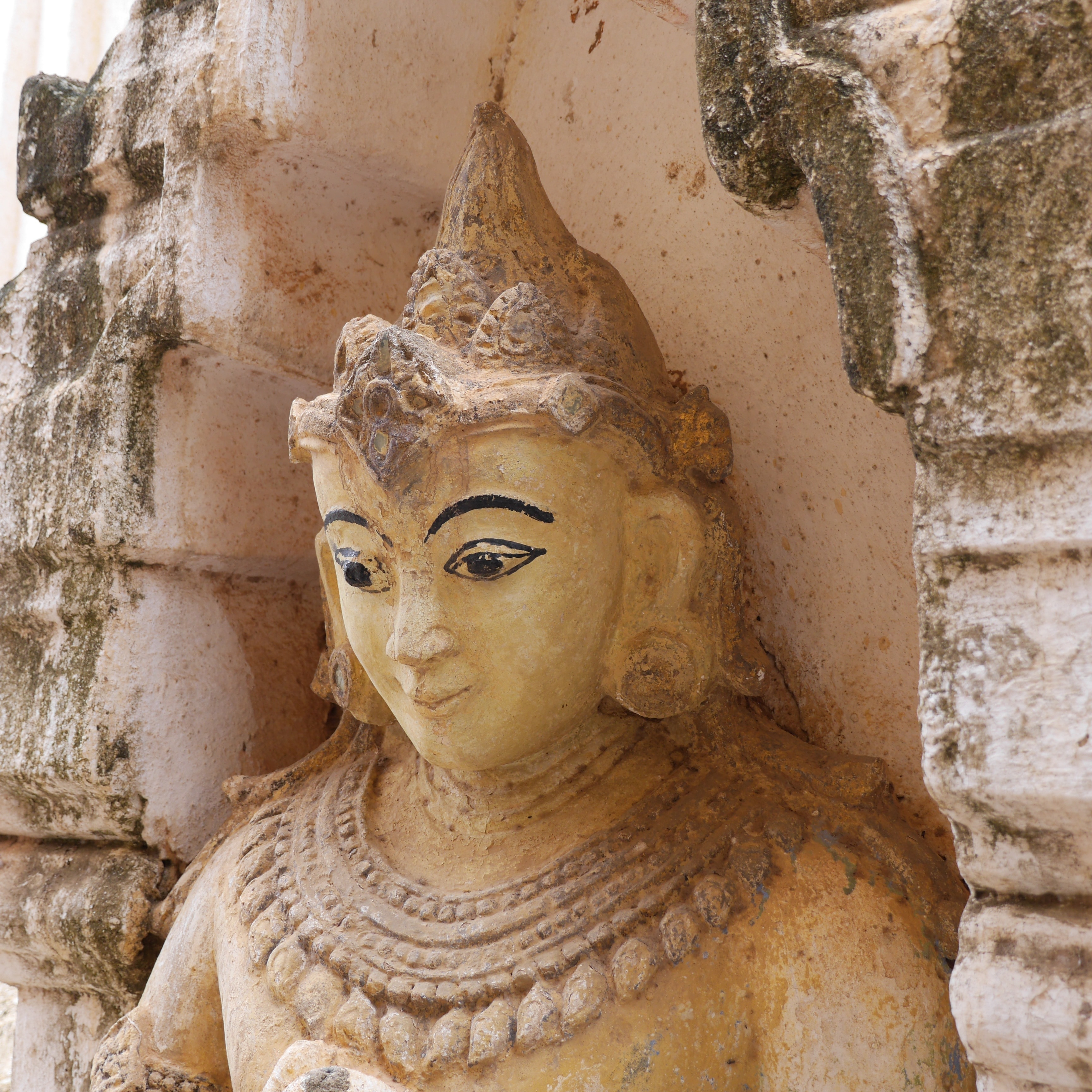 beige ceramic buddha
