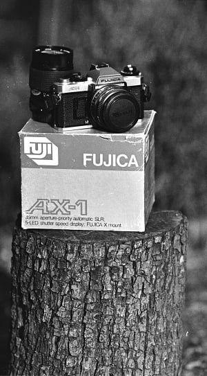 black and silver fujica d-slr with box thumbnail