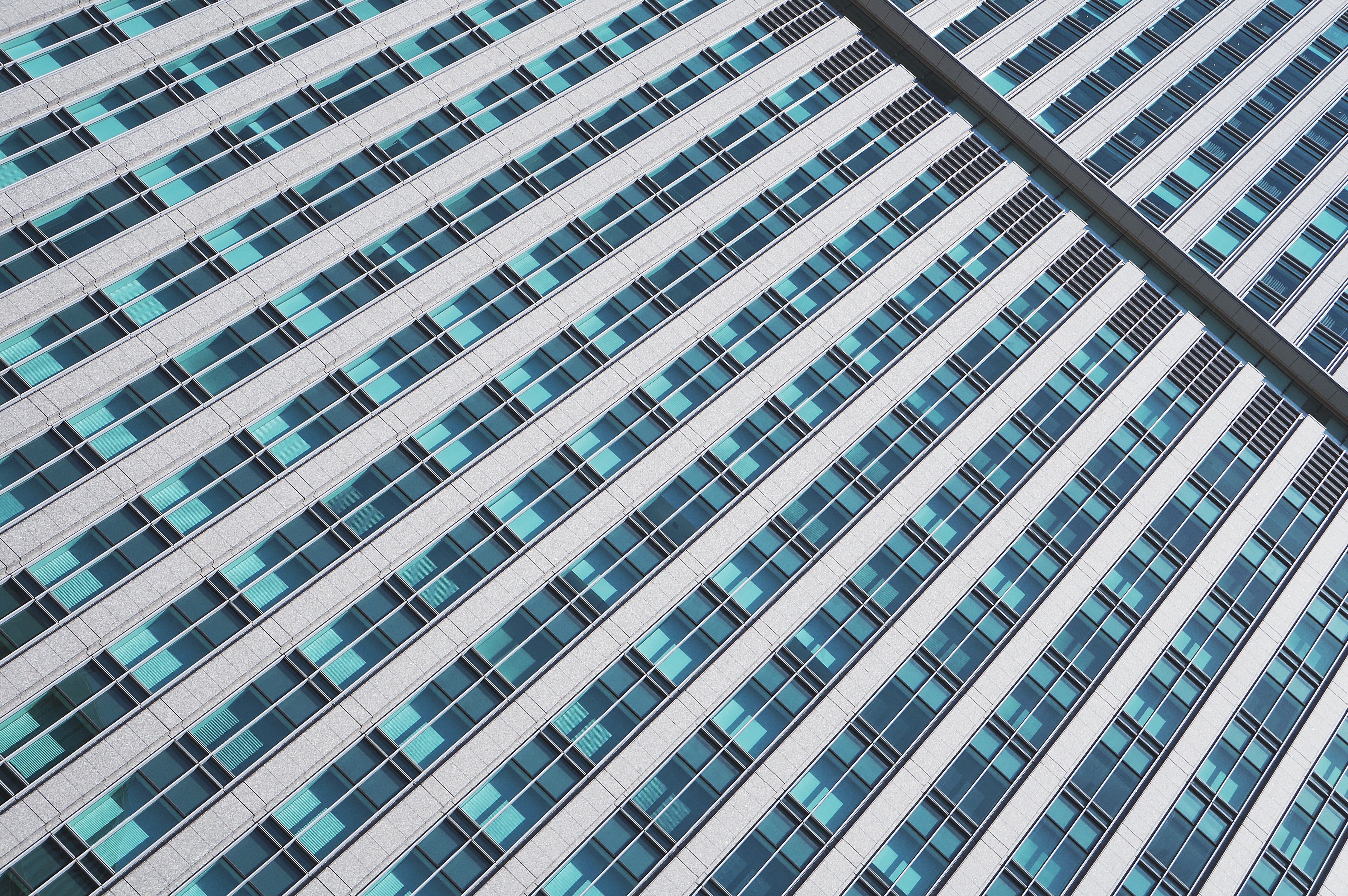 white and teal concrete building