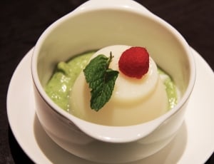white ceramic cup filled with wasabi and wheap cream thumbnail