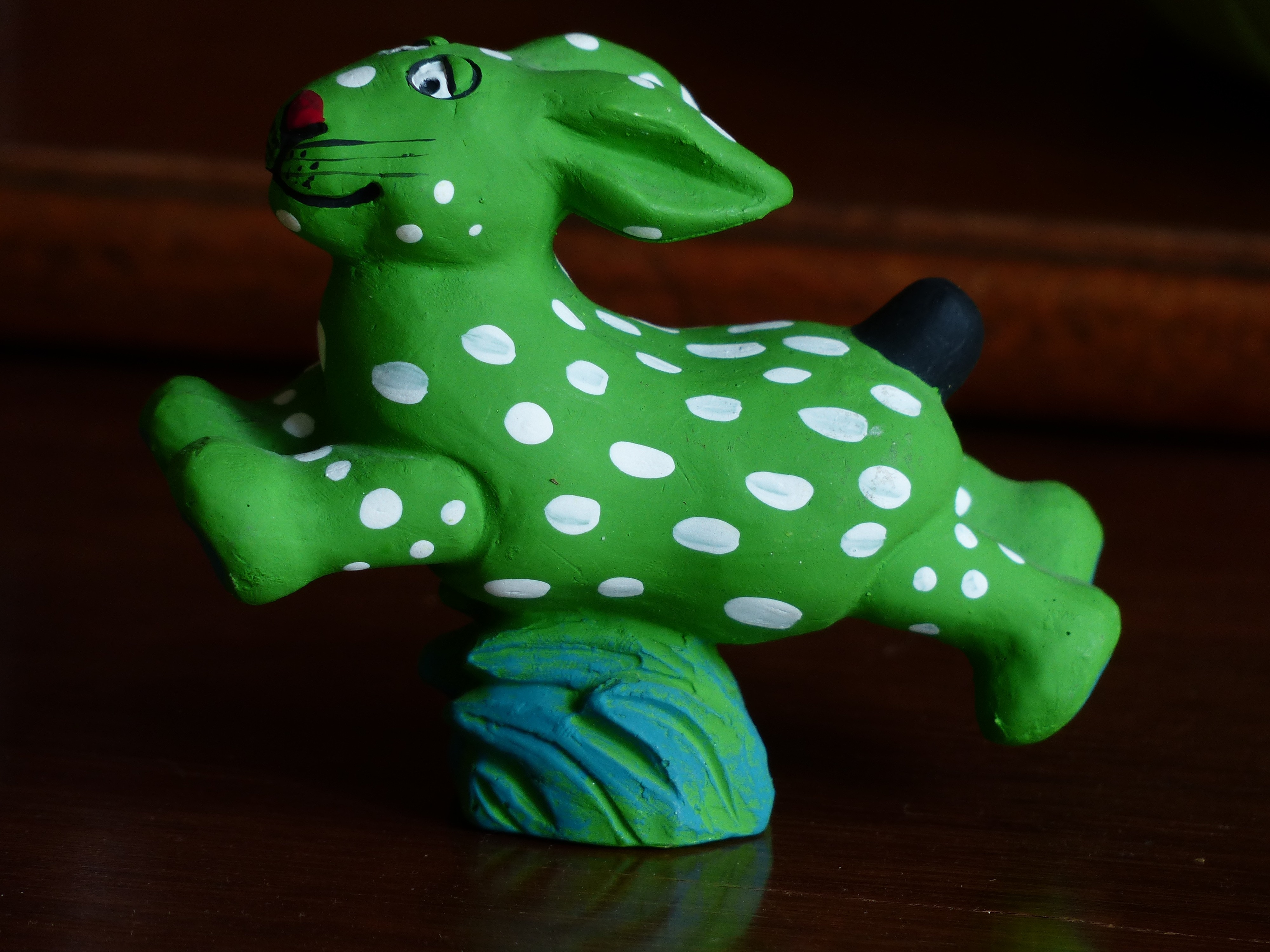 green and white rabbit figurine