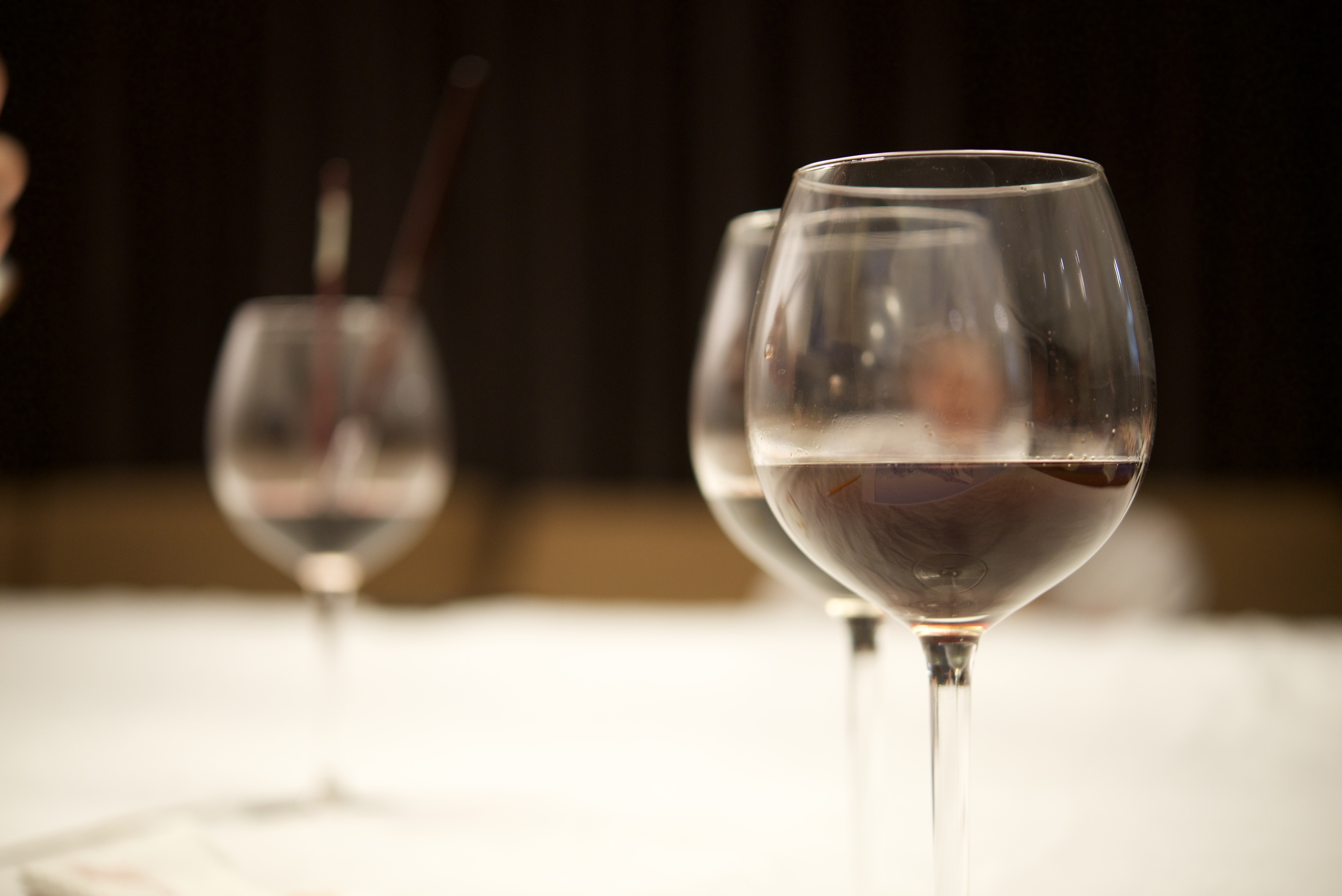 selective focus of wine glass with water