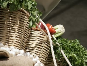 close up photo of brown woven basket with vegetables thumbnail