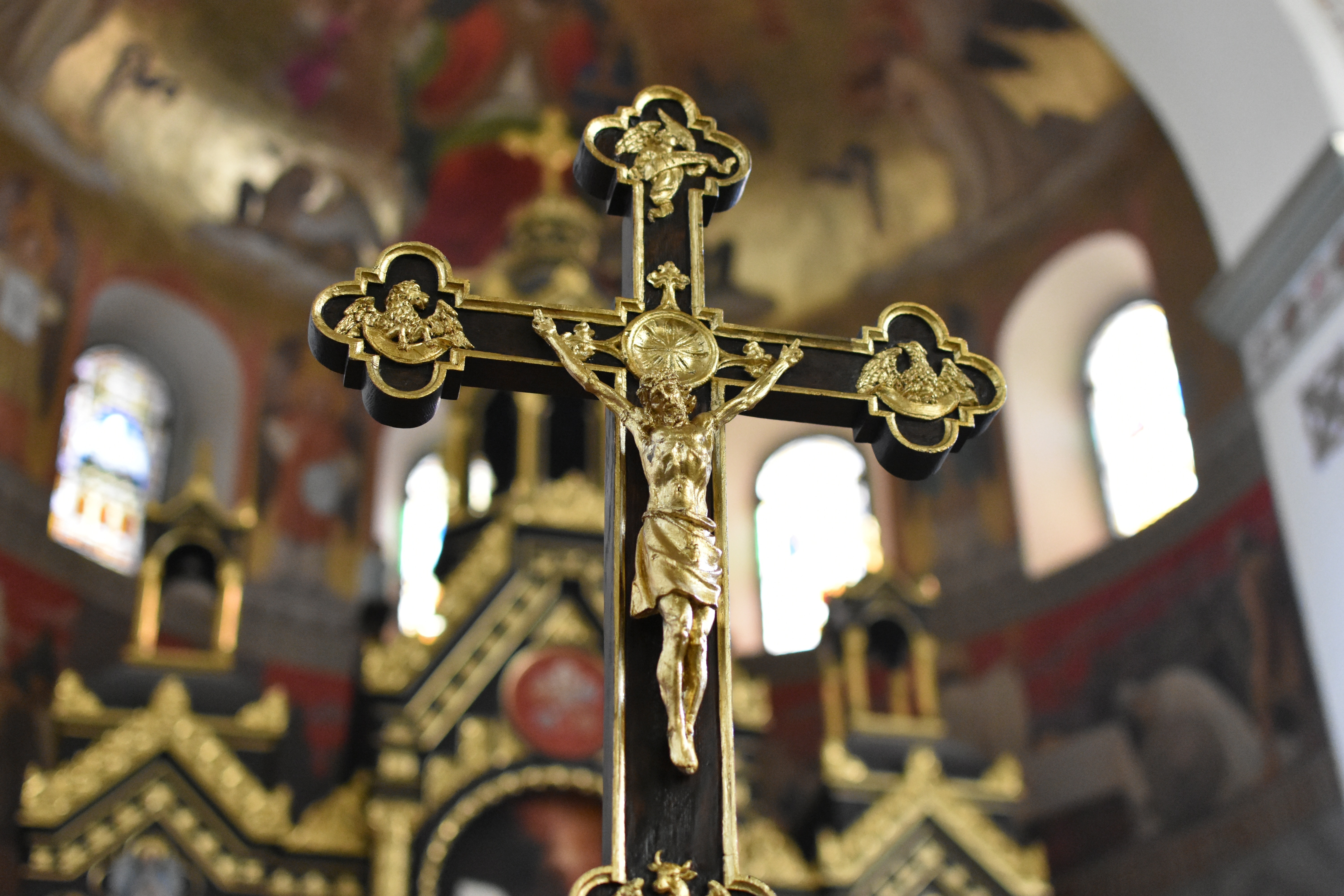black and brass crucifix