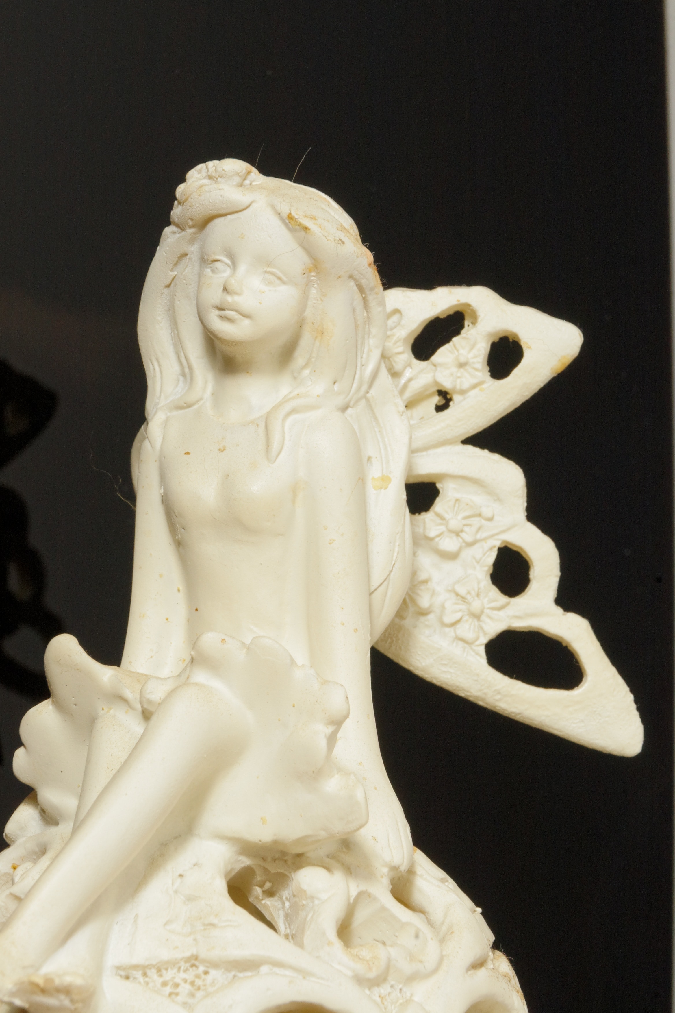 white fairy ceramic figurine