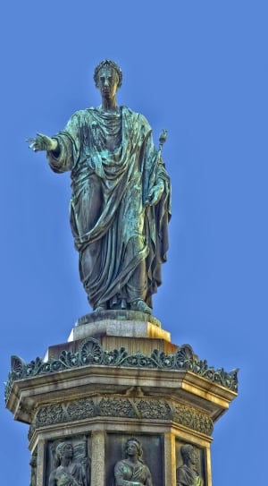 man holding rod statue thumbnail