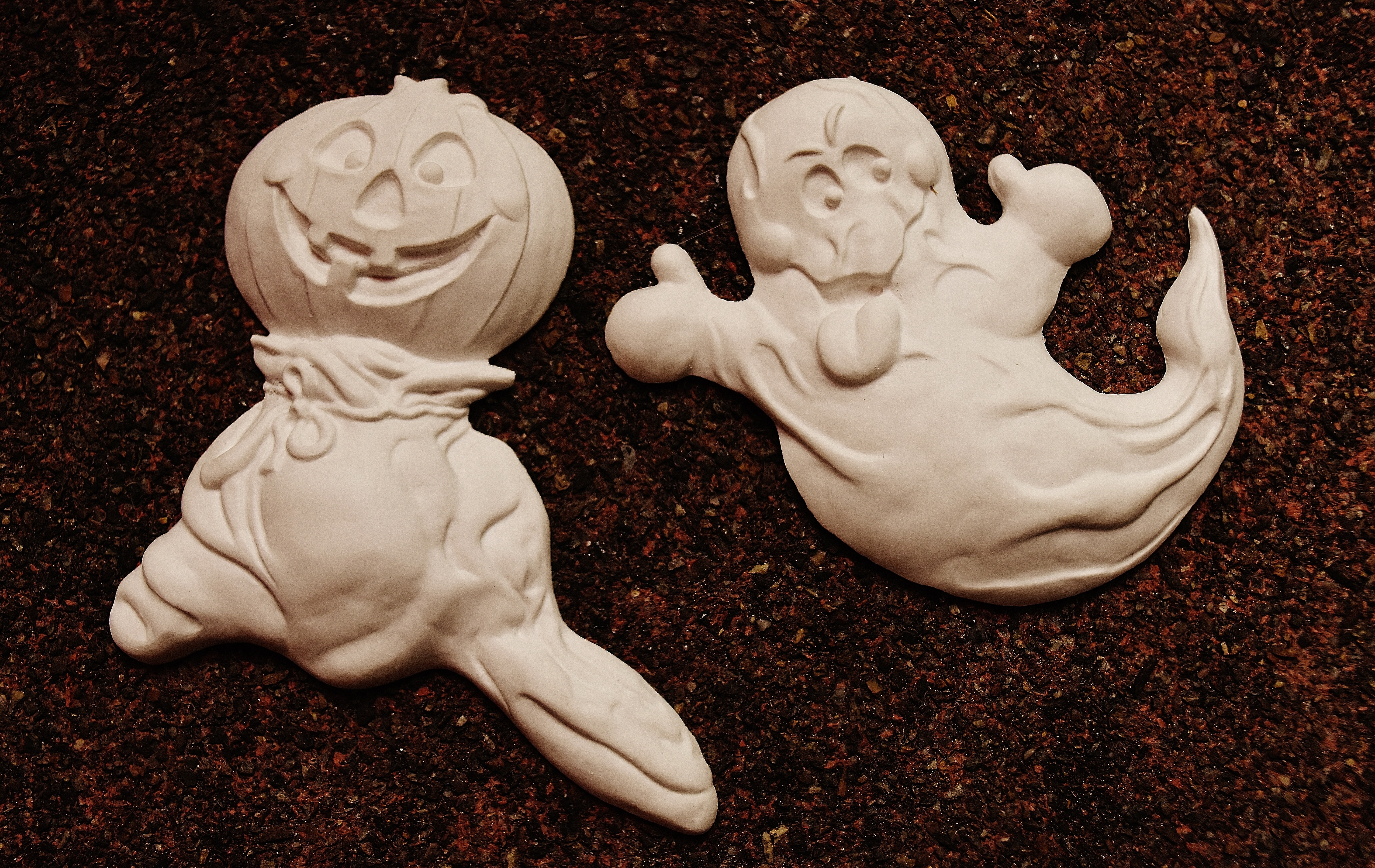 ghost and pumpkin wooden figurine