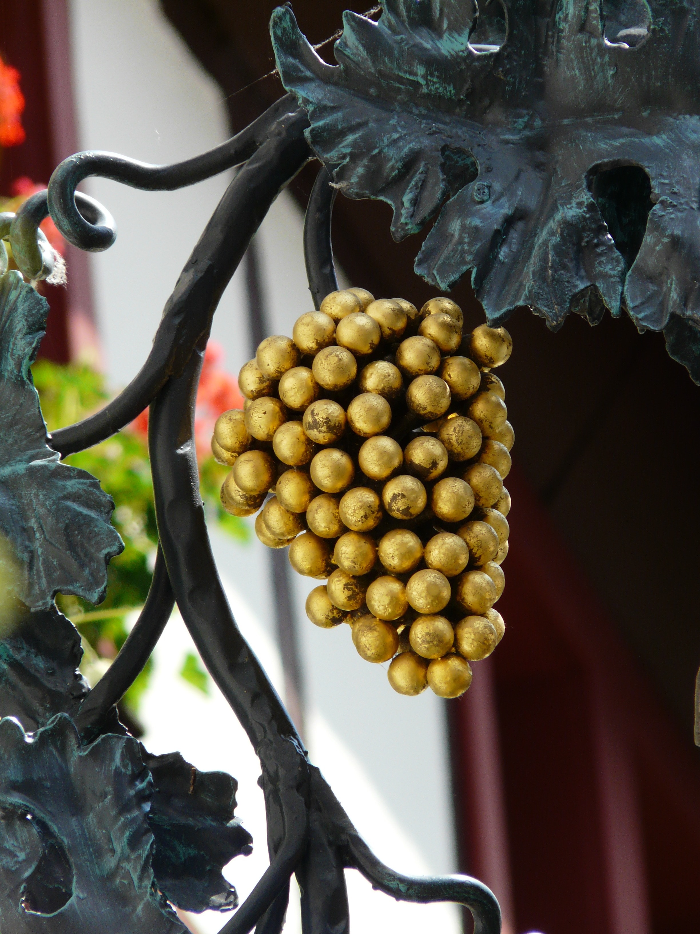 close up photo of gold artificial grape fruit