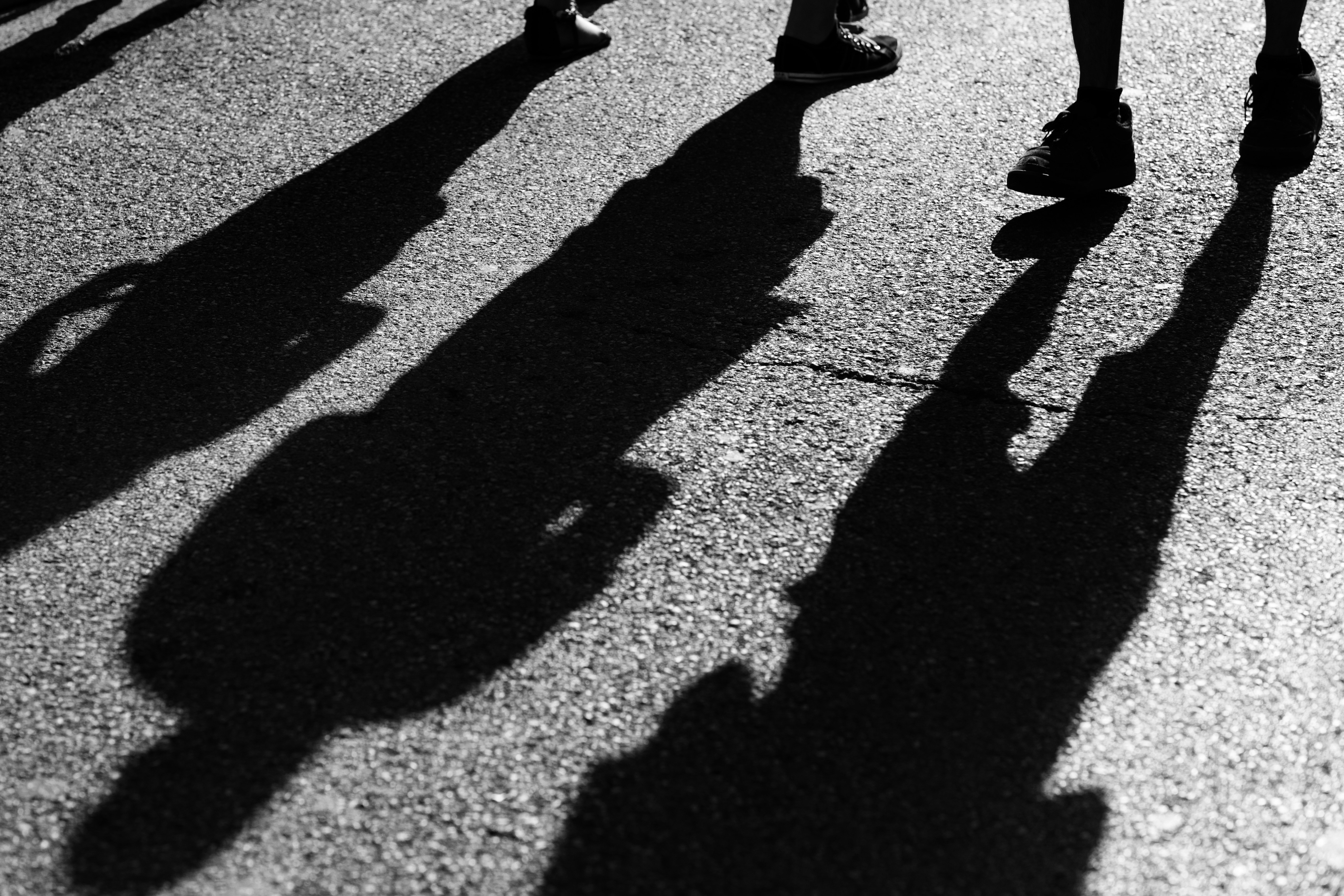 3 human shadows
