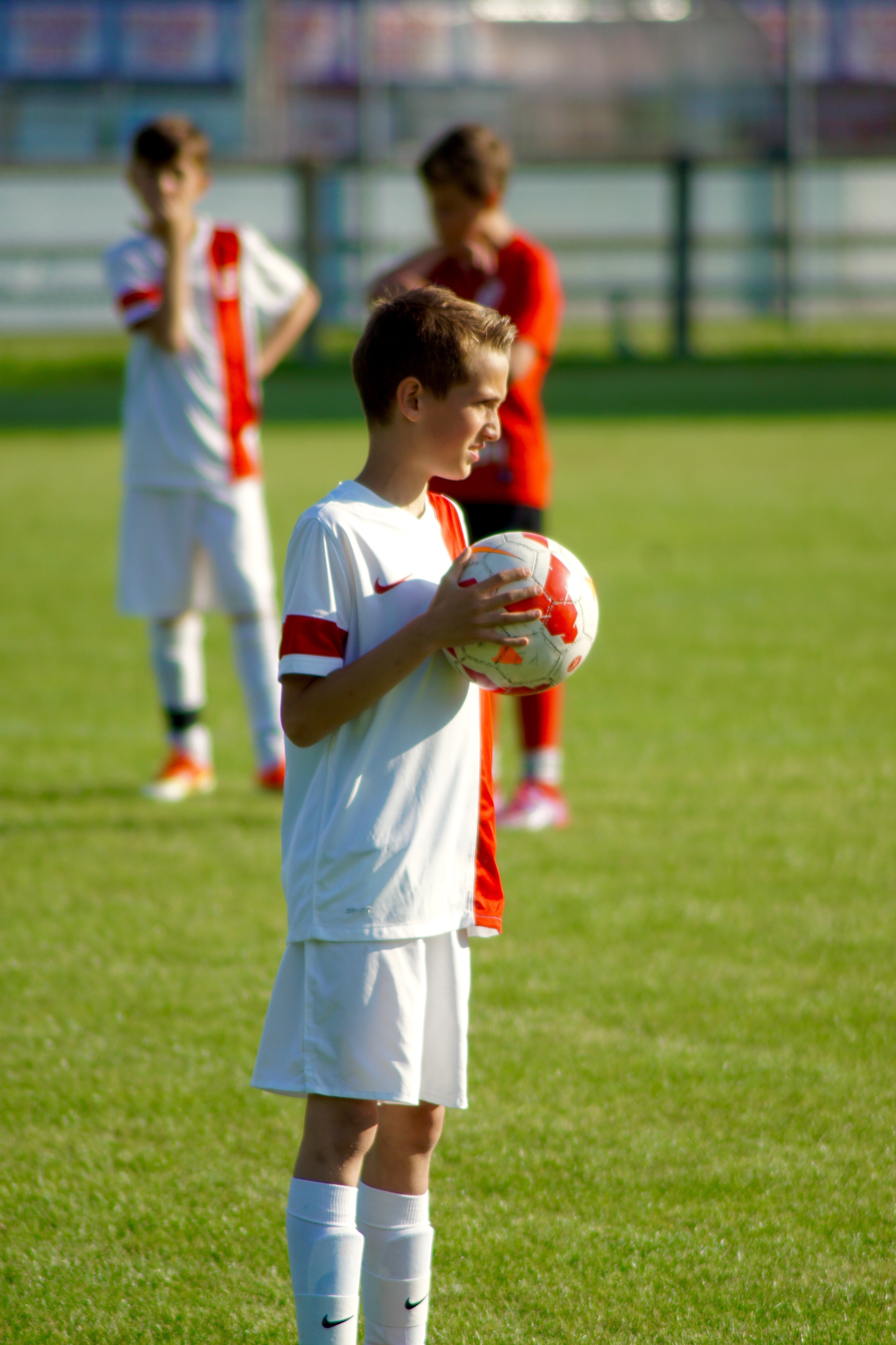 white and red soccer ball