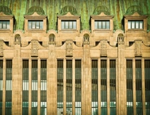 brown and green building thumbnail