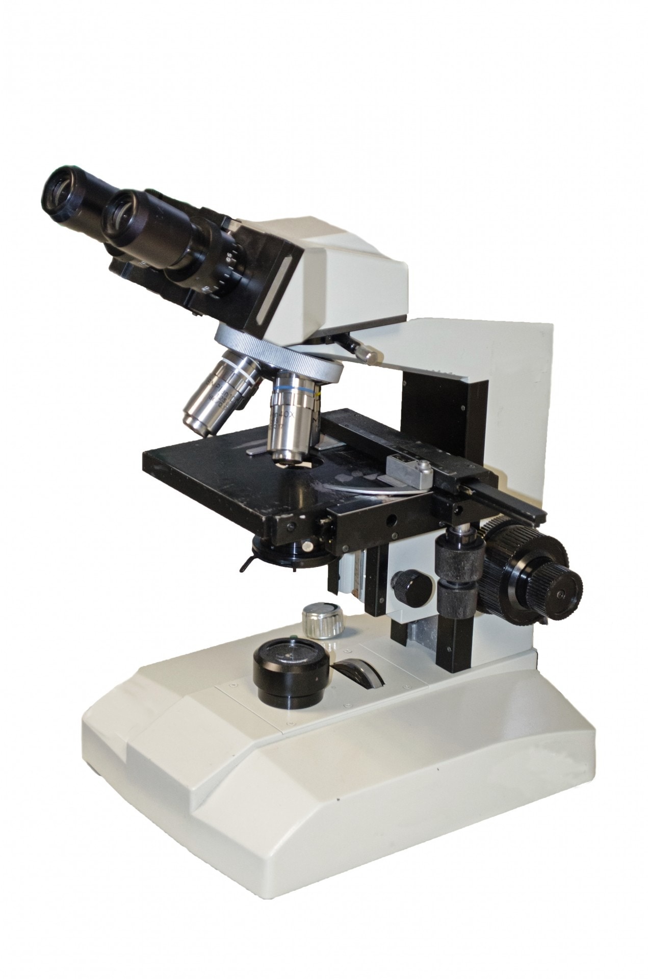 white and black microscope