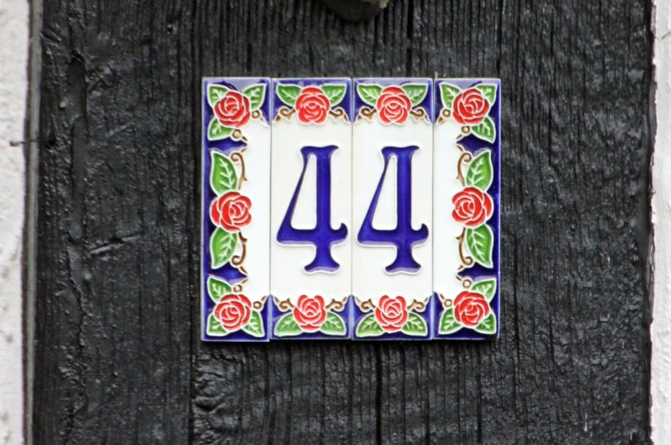 white,red, and blue floral 44 number sign preview