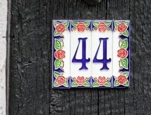 white,red, and blue floral 44 number sign thumbnail