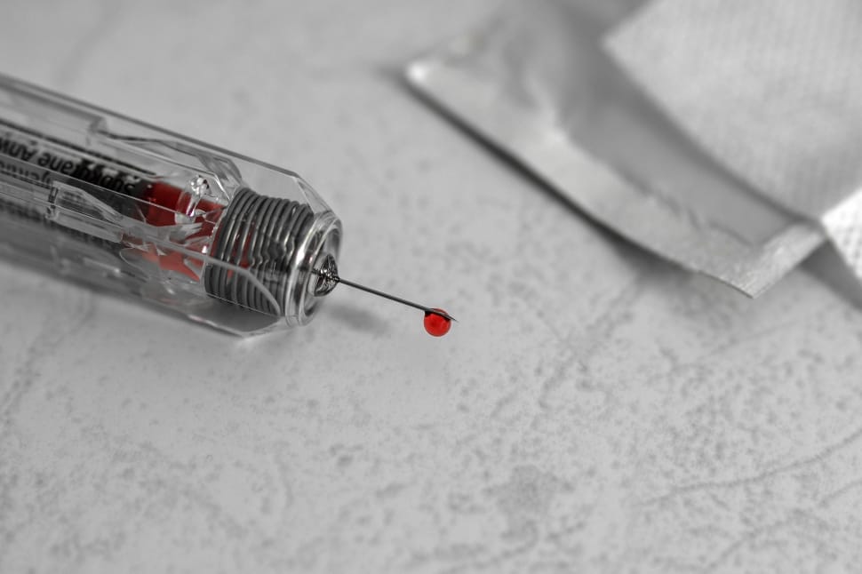 clear syringe with red liquid preview