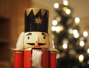 red and white nutcracker figurine thumbnail