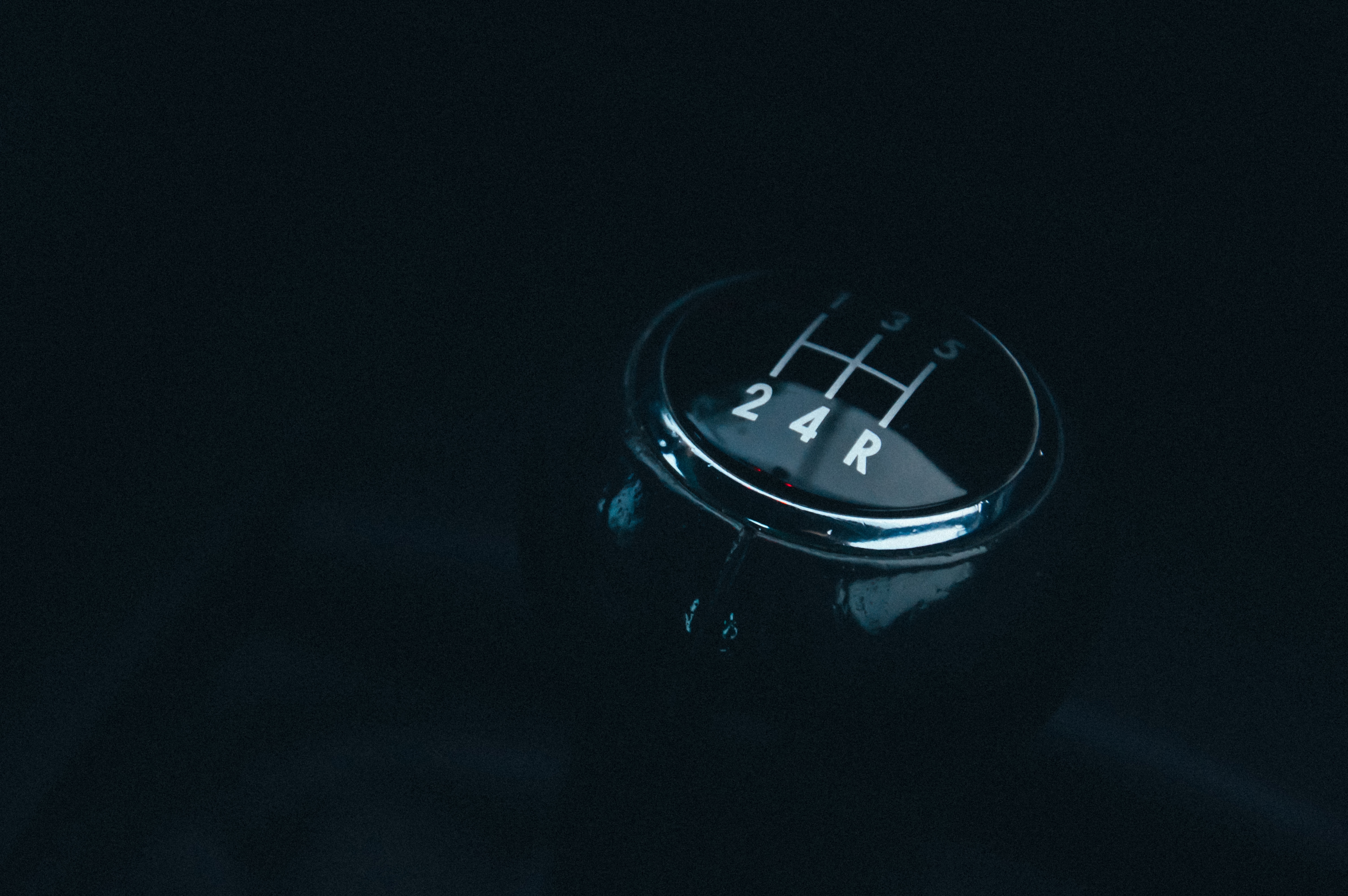 selective focus photography of manual gear shift lever