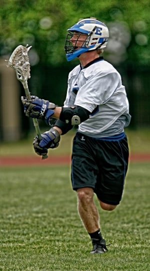 man wearing lacrosse equipment and gear thumbnail