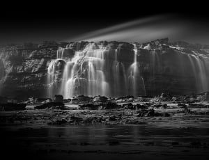 gray scale photo of waterfalls thumbnail