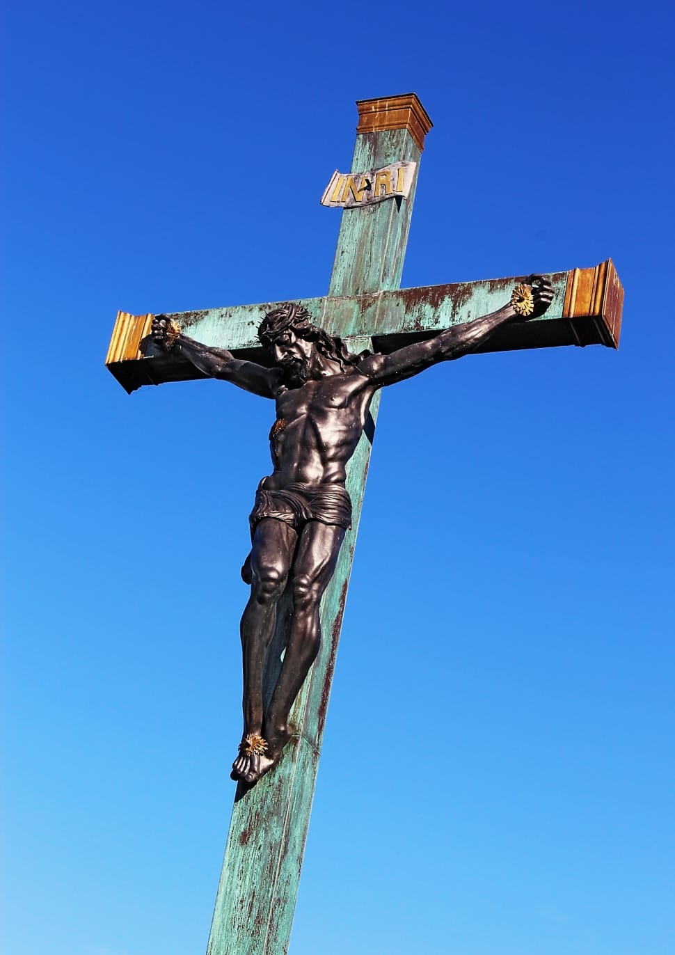 wooden crucifix  during day preview