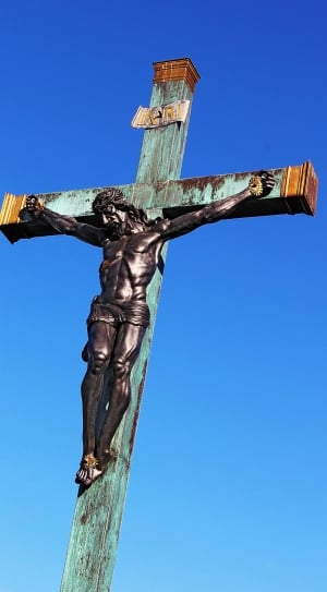 wooden crucifix  during day thumbnail