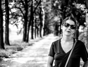 grayscale photography of woman in v neck shirt thumbnail