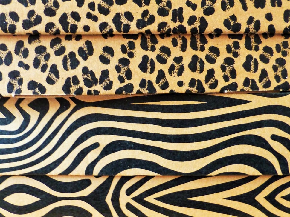 beige and black animal print textile preview